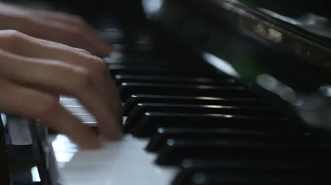 Hands playing piano Stock Footage 12503543