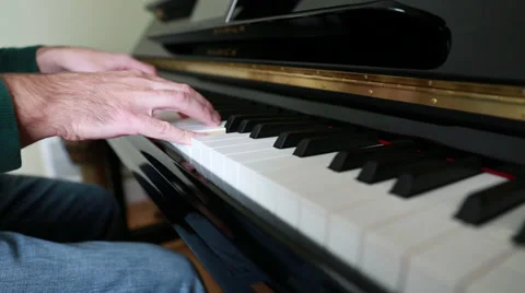 Hands playing the piano Stock Footage 32820837