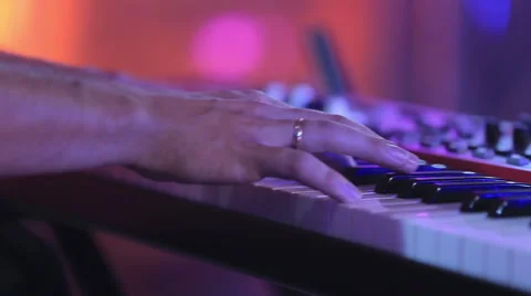 Hands playing the piano Stock Footage 54051586