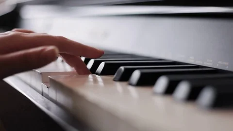 Hands playing piano Stock Footage 76150838