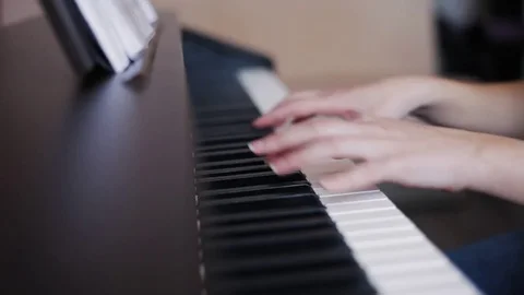 Hands playing piano Stock-Footage 76150862