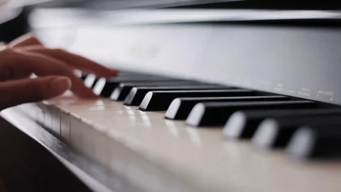 Hands playing piano Stock Footage 76150866