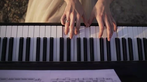 Hands playing piano Stock Footage 142520493