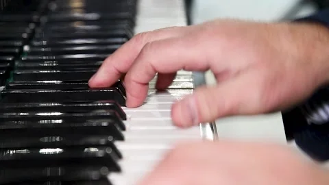 Hands playing the piano Stock Footage 197569746