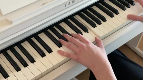 Hands Playing Piano Keys Close Up 動画素材 330491034