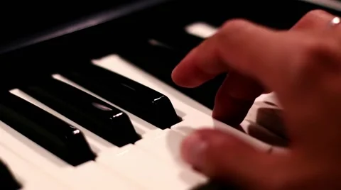 Hands Playing Piano Low Angle 動画素材 64624975