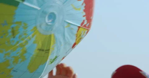 Hands Playing With Plastic Earth Globe Close Up Stock Footage 66539725