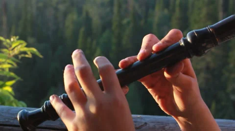 Hands of playing a recorder Video stock 29950267