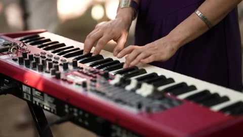 Hands Playing Red Stage Keyboard With Drawbars And Knobs Close Up Stock-Footage 343806185