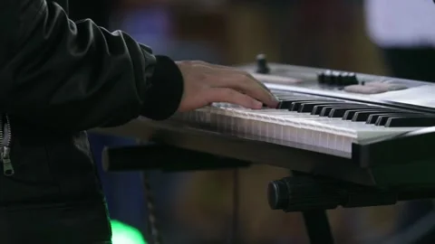 Hands playing a synthesizer or keyboard at a concert. Stock Footage 221662066