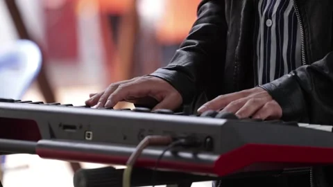 Hands playing a synthesizer or keyboard at a concert. Stock Footage 221662117