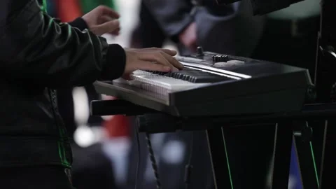 Hands playing a synthesizer or keyboard at a concert Stock Footage 221662957