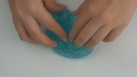 Hands playing toy called slime 스톡 동영상 69883831