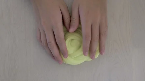 Hands playing toy called slime Video stock 95540869