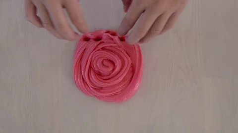 Hands playing toy called slime 스톡 동영상 97179842