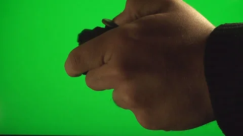 Hands Playing On A Video Console Controller On A Green Screen, Chroma, Key Stock Footage 37150957