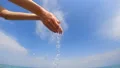 The hands playing with a water in the sea. slow motion HD Footage