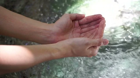 Hands Playing Waterfall clear water in Tropical forest Hd Stock Footage 86601236