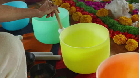 Hands playing on white quartz crystal singing bowls in the gazebo. Healing .. Stock Footage 341240766