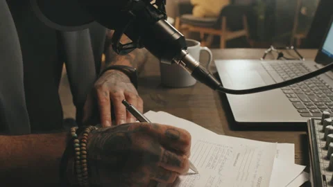 Hands of Podcast Host Editing Script Video stock 161947597