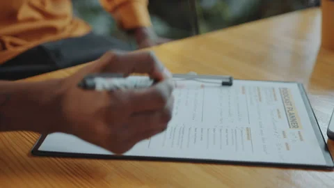 Hands of Podcast Presenter Proofreading Content Planner and Taking Notes Video stock 273762655