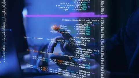 Hands pointing to fictional code in virtual space, representing interactive and Stock Photos