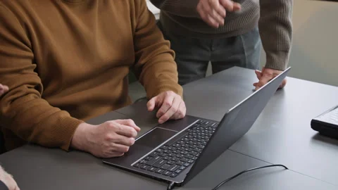 Hands Pointing at Laptop in Computer Class for Seniors Stock Footage 333703492