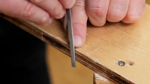 Hands polish outdated jetliner model detail with metal file 스톡 동영상 127376224
