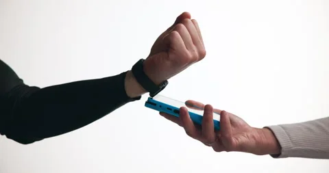 Hands, pos machine and scan smart watch in studio for cashless transaction, Stock Footage 326004239
