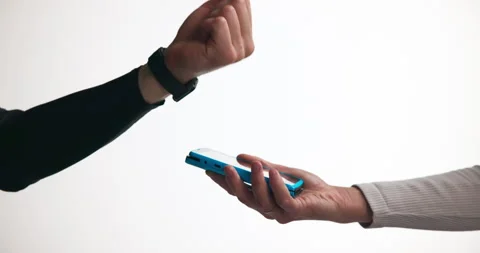 Hands, pos machine and smart watch payment in studio for cashless transaction, Stock Footage 326004784