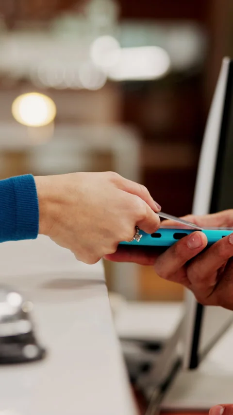 Hands, pos machine or people with credit card at hotel reception, booking Stock Footage 335356319