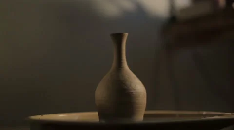Hands of a potter, creating an earthen jar on the circle Stock-Footage 58145251