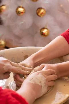 Hands of a potter, creating an earthen jar Stock Photos