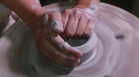Hands of a potter, creating a  jar on the circle 動画素材 61919346