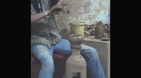 Hands of potter do a clay dish Stock Footage 8650858