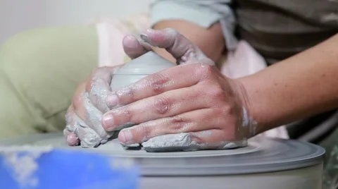 Hands of potter do a clay dish Stock-Footage 61922963