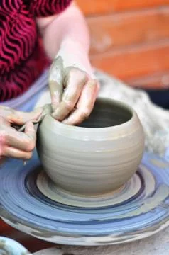 Hands of a potter Stock Photos