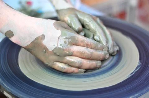 Hands of a potter Stock Photos