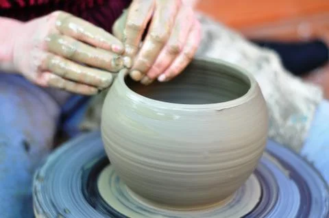 Hands of a potter Stock Photos