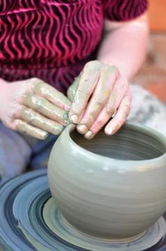 Hands of a potter Stock Photos