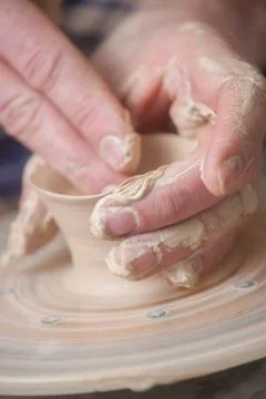 Hands of a potter Stock Photos