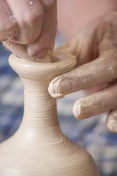 Hands of a potter Stock Photos