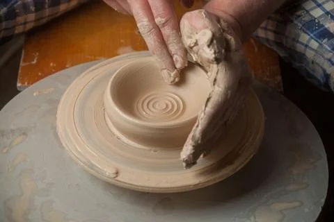 Hands of a potter Stock Photos