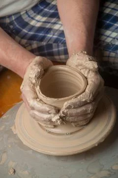 Hands of a potter Stock Photos