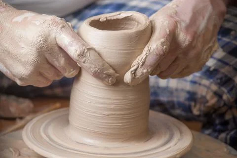 Hands of a potter Stock Photos