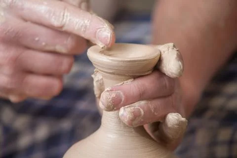 Hands of a potter Stock Photos