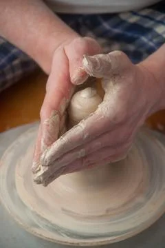Hands of a potter Stock Photos