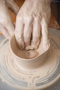 Hands of a potter Stock Photos