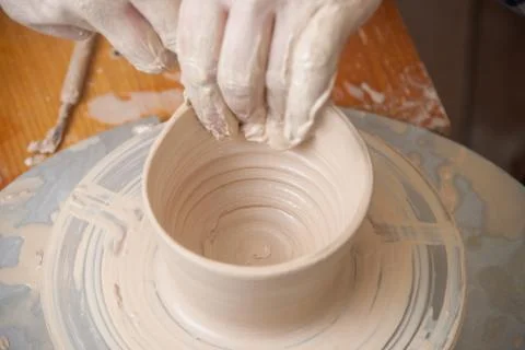 Hands of a potter Stock Photos