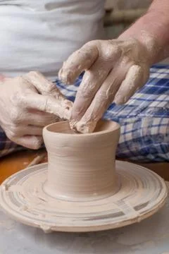 Hands of a potter Stock Photos